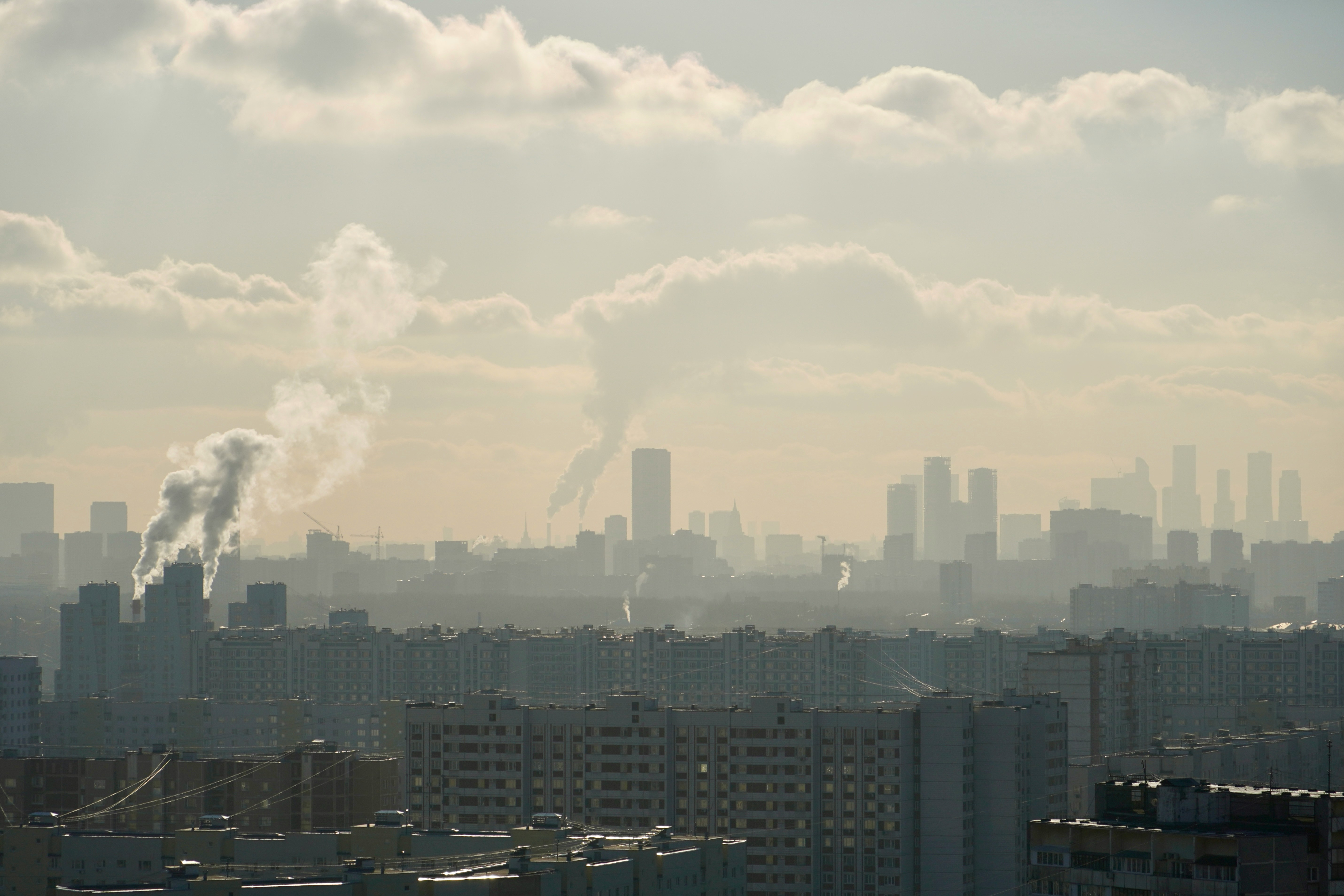 Dense European urban skyline - representing the EU's 220 million pre-standard dwellings targeted by RRF climate expenditure and EPBD renovation requirements