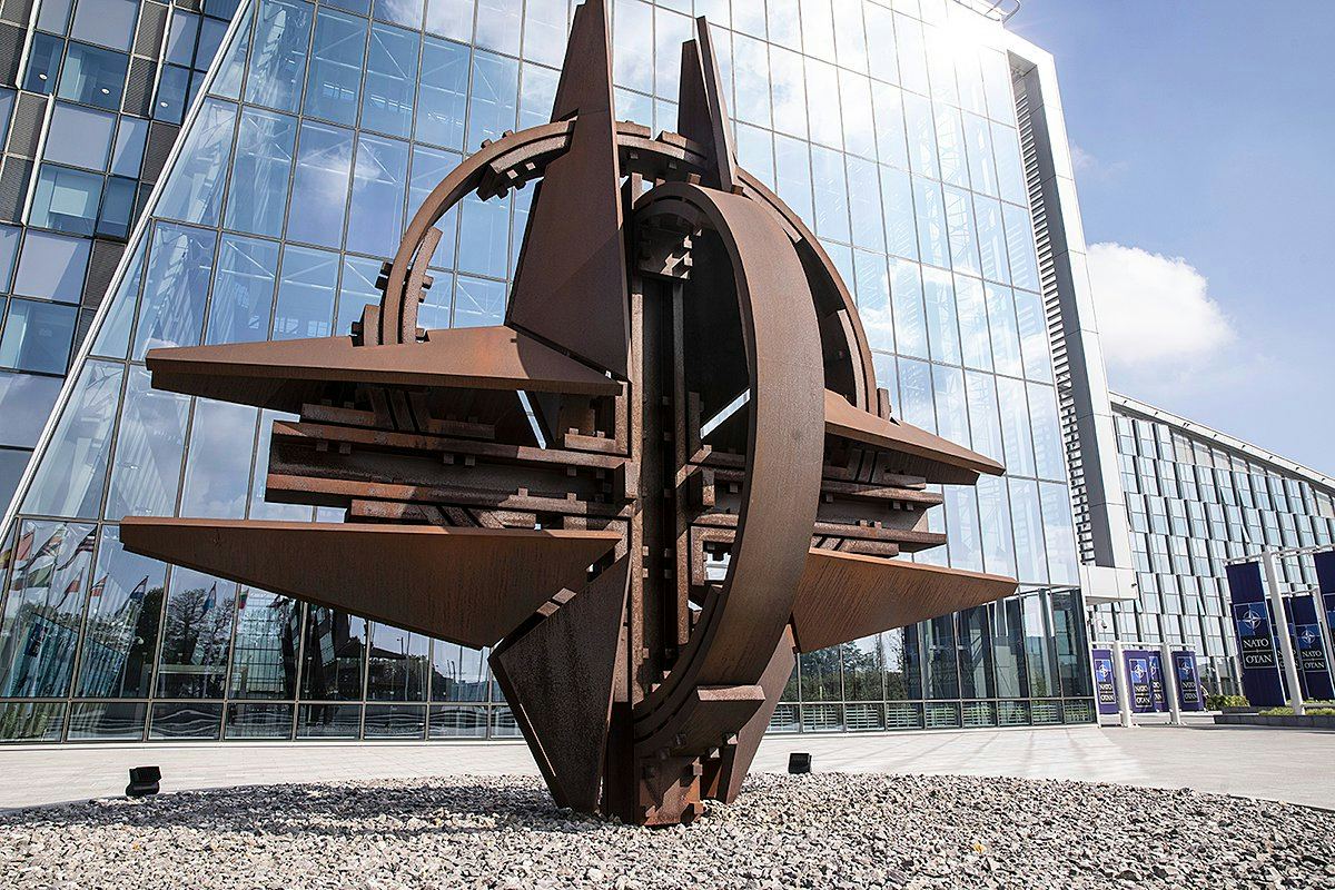 NATO compass rose sculpture at the entrance of NATO Headquarters, Brussels