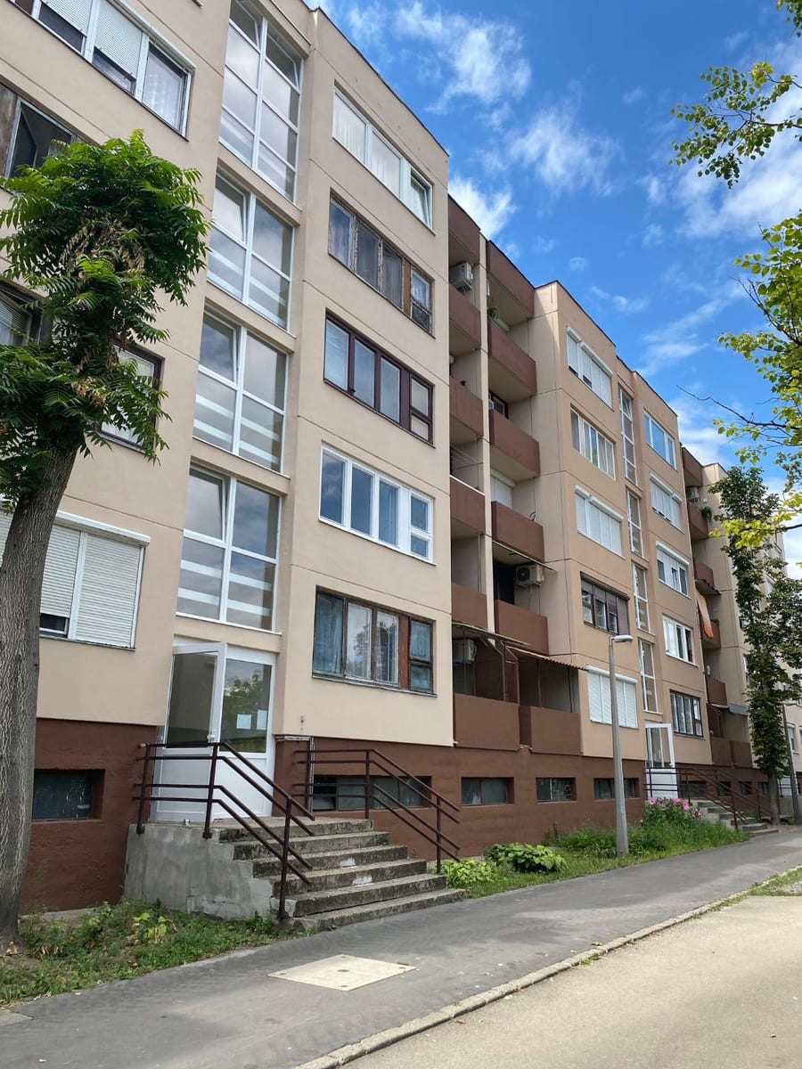 Completed multi-storey panel block façade with GWR NANO INSULATION® coating — street view